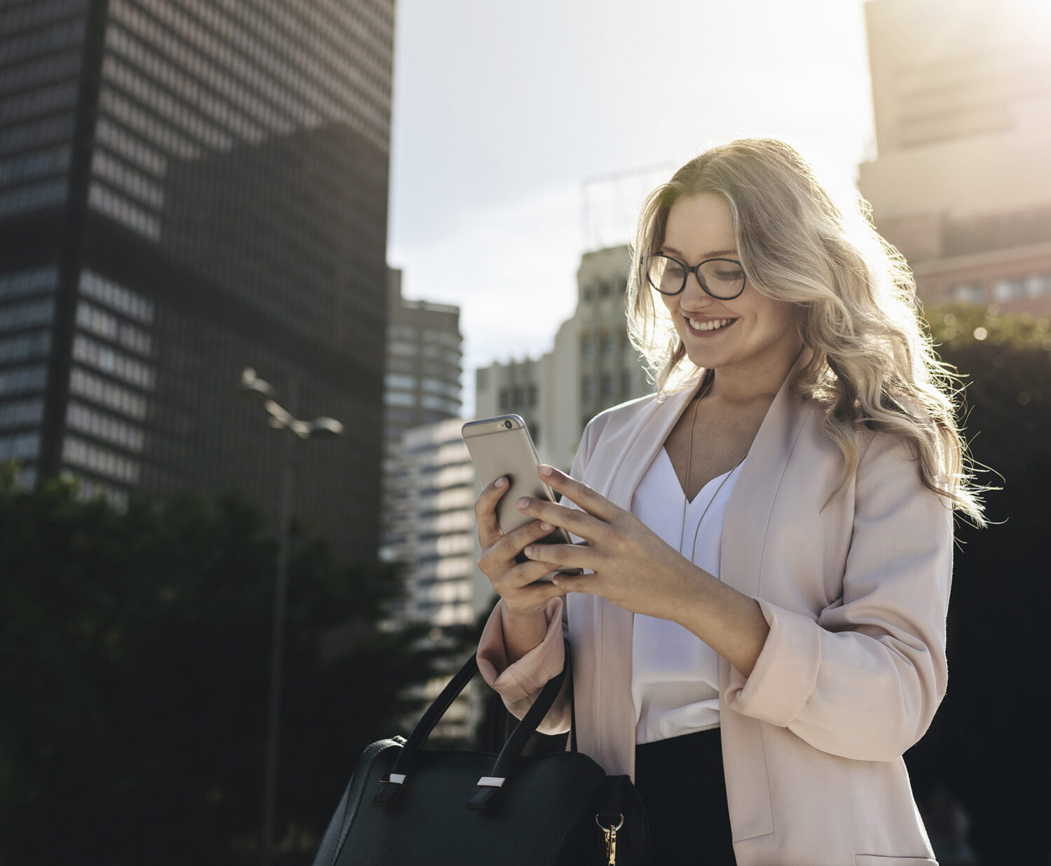Woman smiling at phone